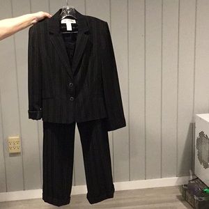 Minimal wear! Business attire Rena Rowen suit.